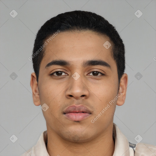 Neutral latino young-adult male with short  black hair and brown eyes