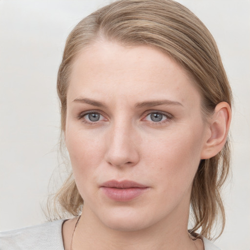 Neutral white young-adult female with medium  brown hair and blue eyes