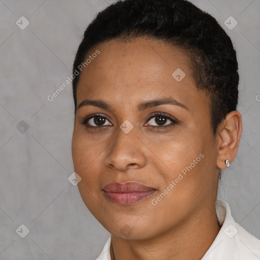 Joyful black young-adult female with short  black hair and brown eyes