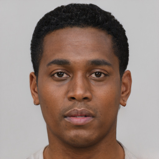 Neutral black young-adult male with short  black hair and brown eyes