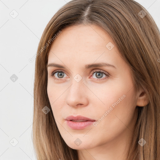 Neutral white young-adult female with long  brown hair and brown eyes