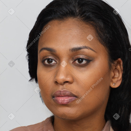 Neutral black young-adult female with long  black hair and brown eyes