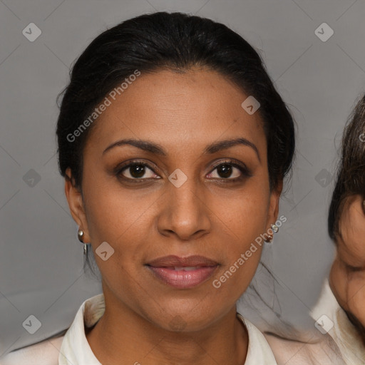 Joyful black young-adult female with medium  brown hair and brown eyes