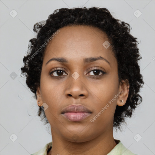 Neutral black young-adult female with short  black hair and brown eyes