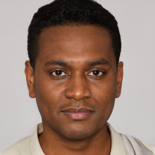 Neutral black young-adult male with short  brown hair and brown eyes