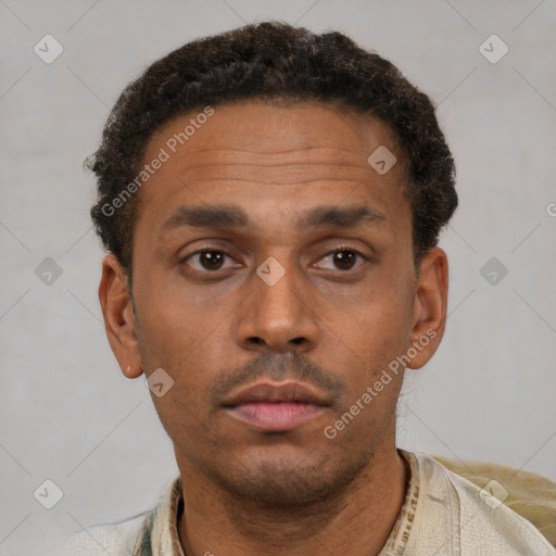 Neutral latino young-adult male with short  brown hair and brown eyes