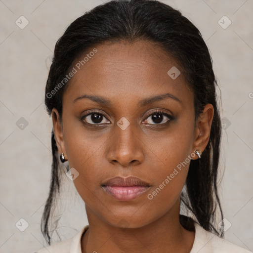 Neutral black young-adult female with medium  brown hair and brown eyes