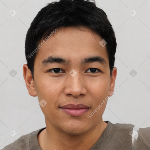 Joyful asian young-adult male with short  black hair and brown eyes