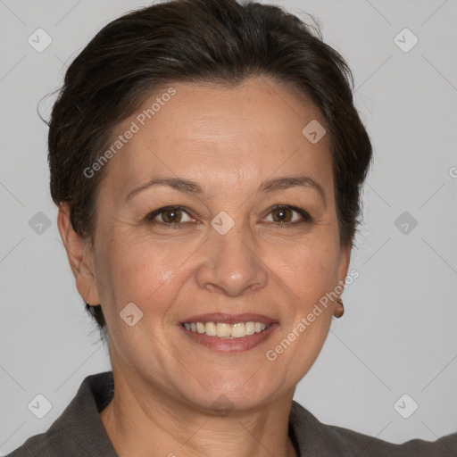 Joyful white adult female with medium  brown hair and brown eyes