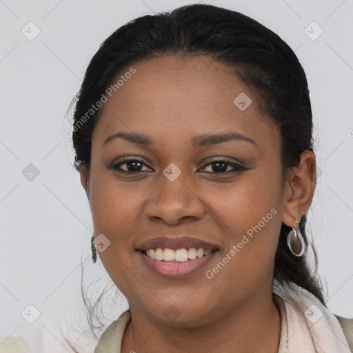 Joyful latino young-adult female with long  brown hair and brown eyes