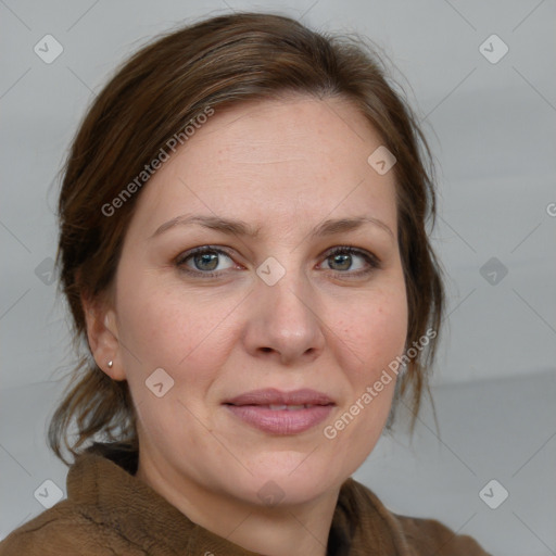 Joyful white adult female with medium  brown hair and grey eyes