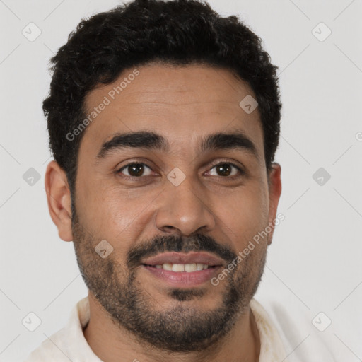 Joyful white young-adult male with short  black hair and brown eyes