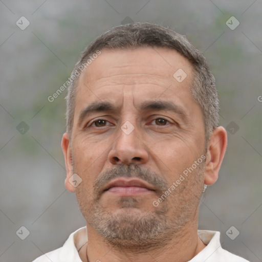 Neutral white adult male with short  brown hair and brown eyes