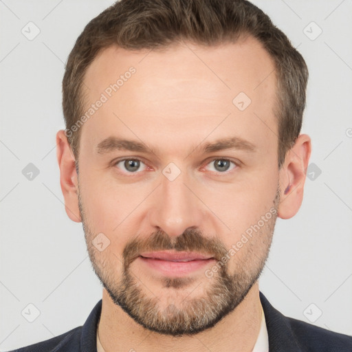 Joyful white adult male with short  brown hair and brown eyes