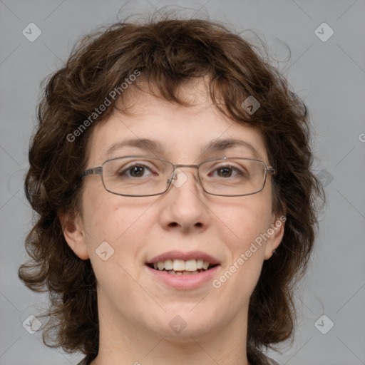 Joyful white young-adult female with medium  brown hair and green eyes