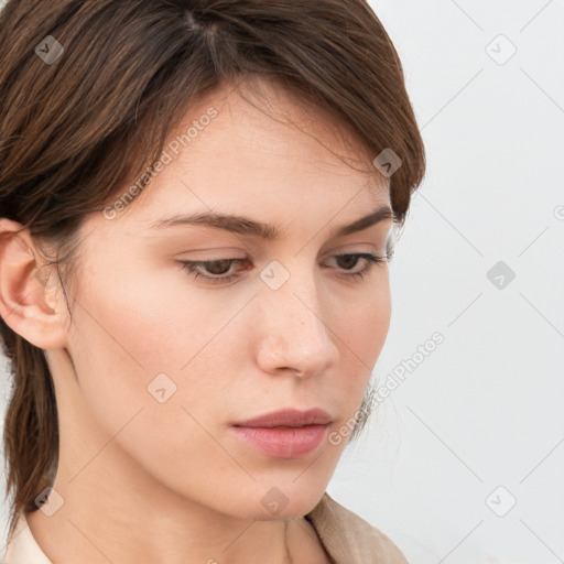 Neutral white young-adult female with medium  brown hair and brown eyes