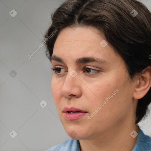 Neutral white young-adult female with medium  brown hair and brown eyes