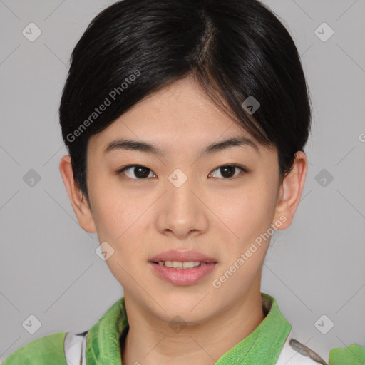 Joyful asian young-adult female with short  brown hair and brown eyes