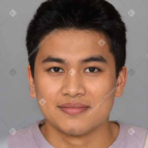 Joyful latino young-adult male with short  brown hair and brown eyes