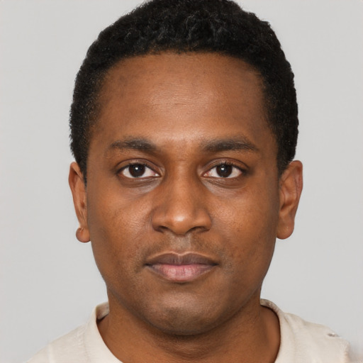 Neutral black young-adult male with short  brown hair and brown eyes