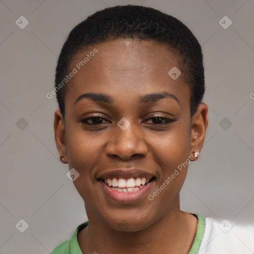 Joyful black young-adult female with short  black hair and brown eyes