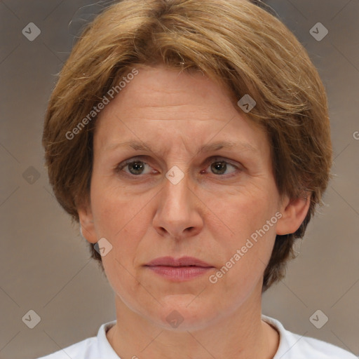 Joyful white adult female with short  brown hair and brown eyes