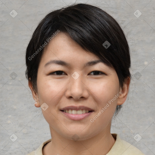 Joyful asian young-adult female with short  brown hair and brown eyes