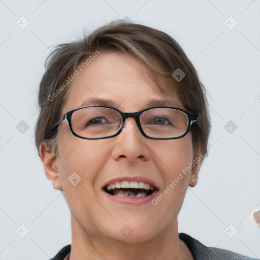 Joyful white adult female with medium  brown hair and blue eyes