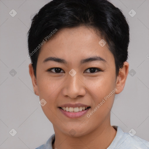 Joyful asian young-adult female with short  black hair and brown eyes