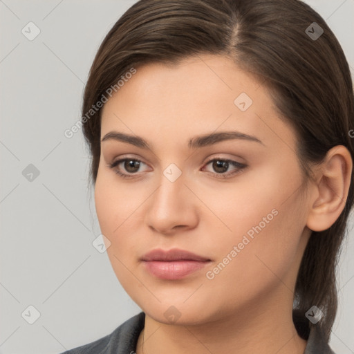 Neutral white young-adult female with medium  brown hair and brown eyes