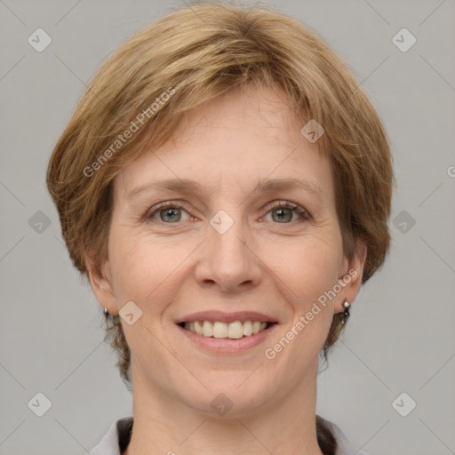 Joyful white adult female with medium  brown hair and grey eyes