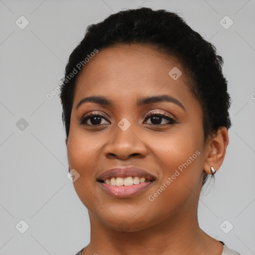 Joyful latino young-adult female with short  black hair and brown eyes