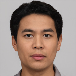 Neutral asian young-adult male with short  black hair and brown eyes