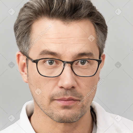 Neutral white adult male with short  brown hair and brown eyes