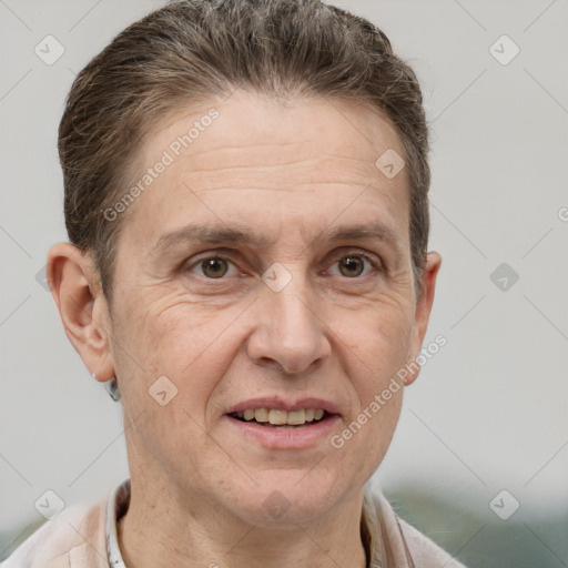 Joyful white adult male with short  brown hair and grey eyes