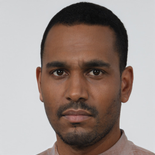Neutral black young-adult male with short  black hair and brown eyes
