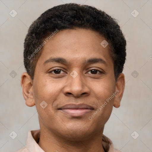 Joyful latino young-adult male with short  brown hair and brown eyes