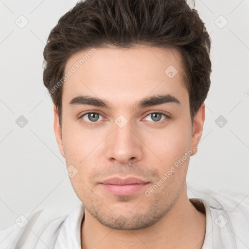 Neutral white young-adult male with short  brown hair and brown eyes