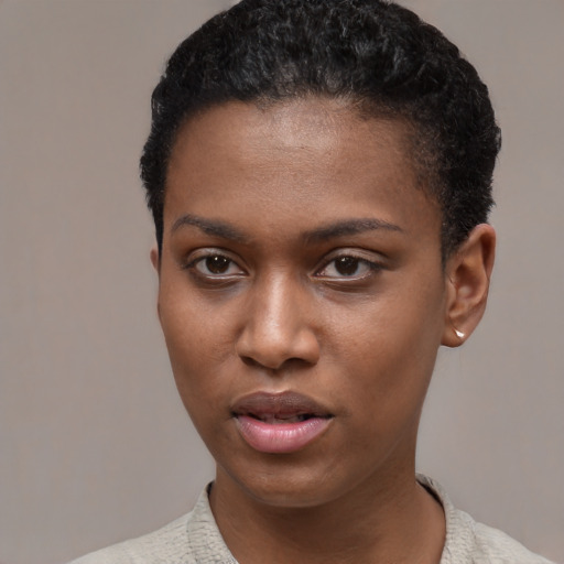 Neutral latino young-adult female with short  black hair and brown eyes