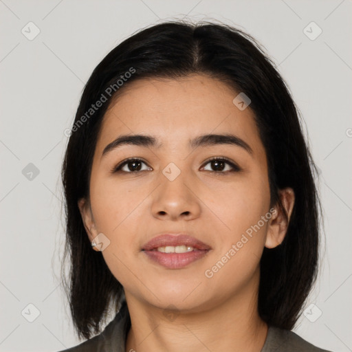 Joyful asian young-adult female with medium  black hair and brown eyes