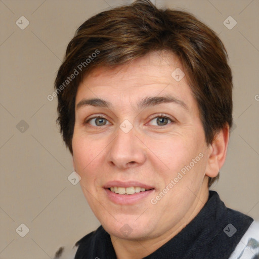 Joyful white adult female with short  brown hair and brown eyes