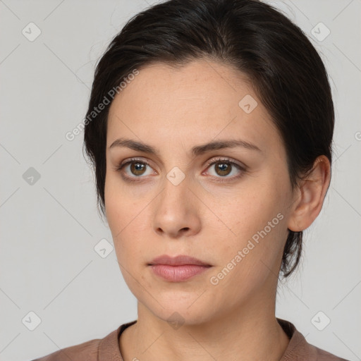 Neutral white young-adult female with medium  brown hair and brown eyes