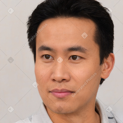 Neutral asian young-adult male with short  black hair and brown eyes