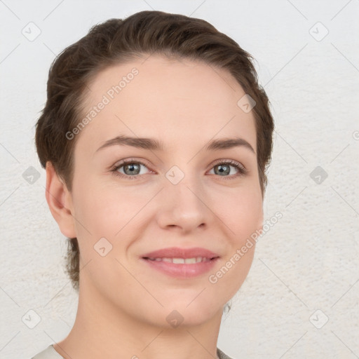 Joyful white young-adult female with short  brown hair and grey eyes