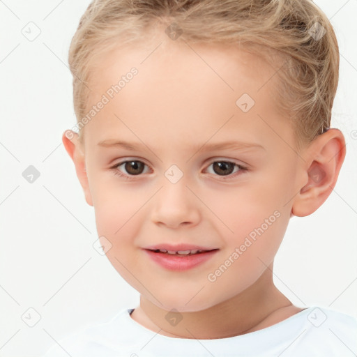 Joyful white child female with short  brown hair and brown eyes