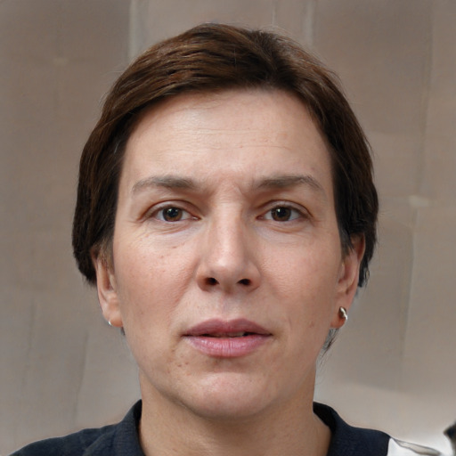 Neutral white adult female with short  brown hair and brown eyes