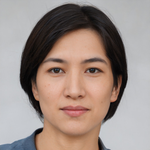 Neutral asian young-adult female with medium  black hair and brown eyes