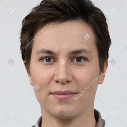 Joyful white adult female with short  brown hair and brown eyes