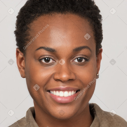 Joyful black young-adult female with short  brown hair and brown eyes