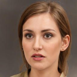 Neutral white young-adult female with medium  brown hair and brown eyes